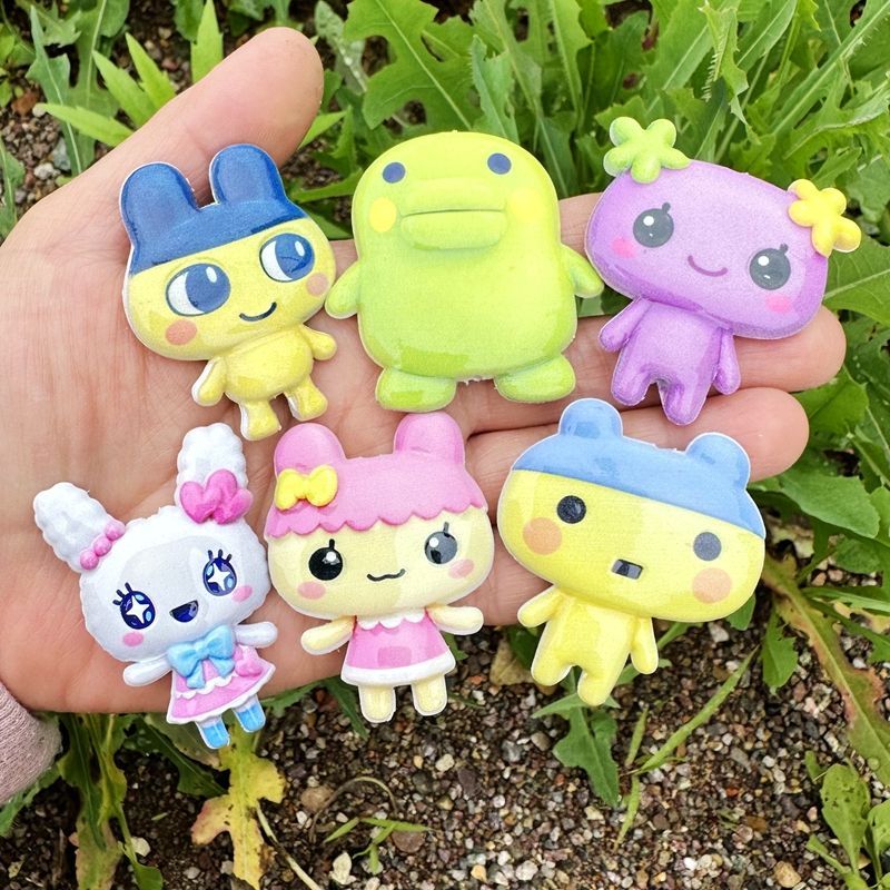 45mm Cartoon Tamagotchi dubbel - Jewelry Making Accessories recensie en prijs