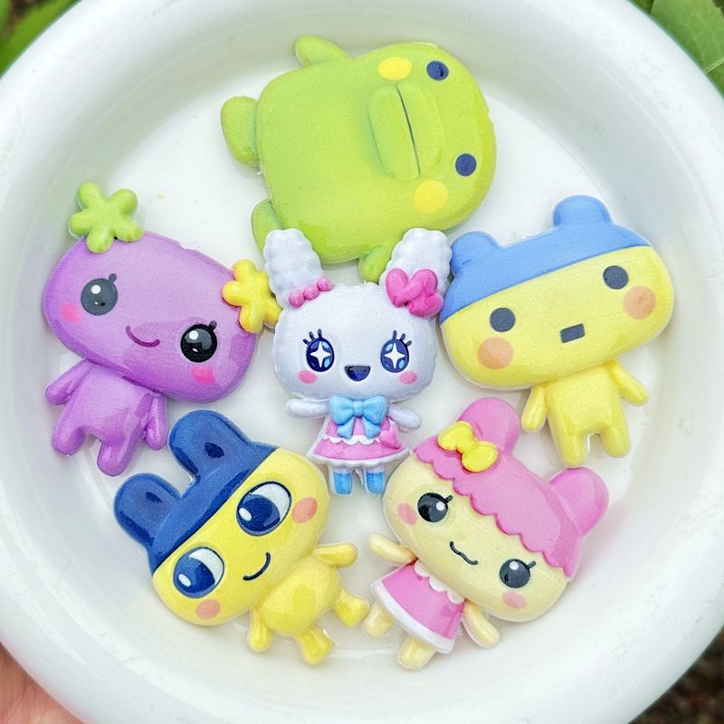 45mm Cartoon Tamagotchi dubbel - Jewelry Making Accessories recensie en prijs